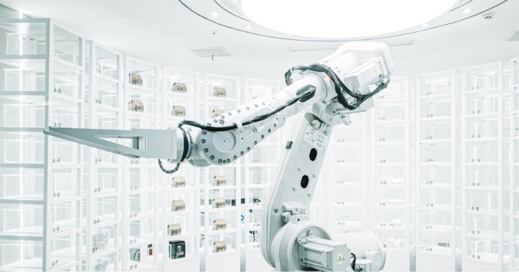 Big robotic arm in room full of labeled shelves representing AI tools