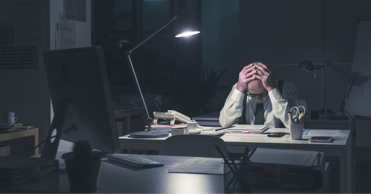 Executive reviewing cybersecurity compliance certification documents