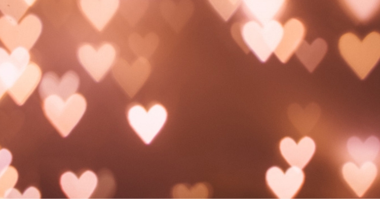 Light in the shape of hearts falling