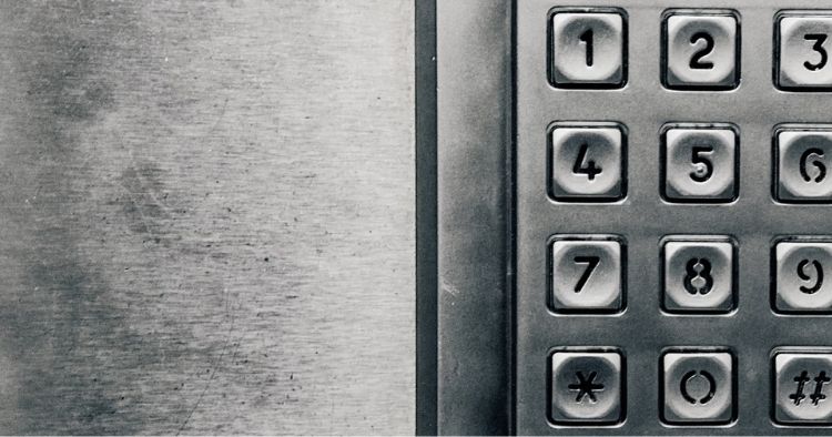 A keypad with the numbers sero through nine and the asterik and pound symbol representing the use of passwords in our daily life