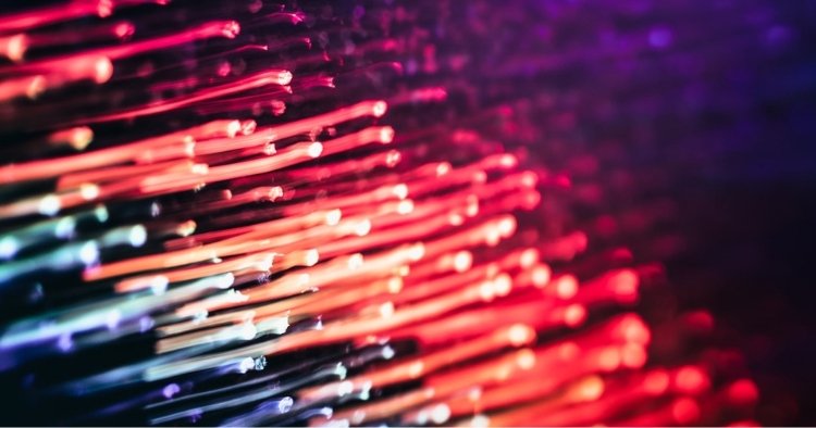 Dripping wax in all different shades of purple, orange, and red